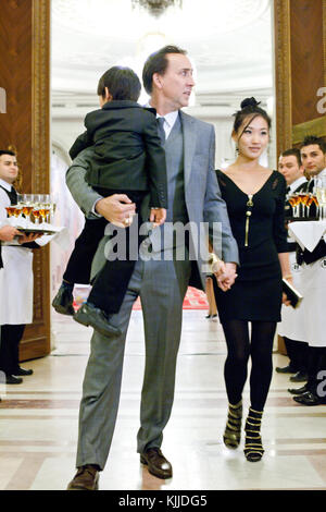 BUCHAREST, ROMANIA - OCT 31:  Actor Nicolas Cage, Alice Kim Cage and son Kal-El at The Halloween Ball of the Parliament Palace in Bucharest.  on October 31, 2010 in Bucharest, Romania  People:  Nicolas Cage Alice Kim Cage Kal-E Stock Photo