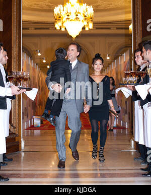 BUCHAREST, ROMANIA - OCT 31:  Actor Nicolas Cage, Alice Kim Cage and son Kal-El at The Halloween Ball of the Parliament Palace in Bucharest.  on October 31, 2010 in Bucharest, Romania  People:  Nicolas Cage Alice Kim Cage Kal-E Stock Photo