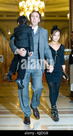 BUCHAREST, ROMANIA - OCT 31:  Actor Nicolas Cage, Alice Kim Cage and son Kal-El at The Halloween Ball of the Parliament Palace in Bucharest.  on October 31, 2010 in Bucharest, Romania  People:  Nicolas Cage Alice Kim Cage Kal-E Stock Photo