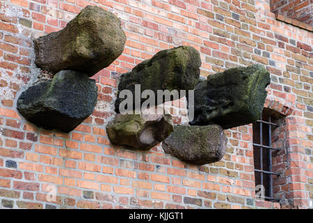 Stone reinforcement, remnants of construction in the Teutonic castle. Remains of the balcony construction of stone structure. Autumn season Stock Photo