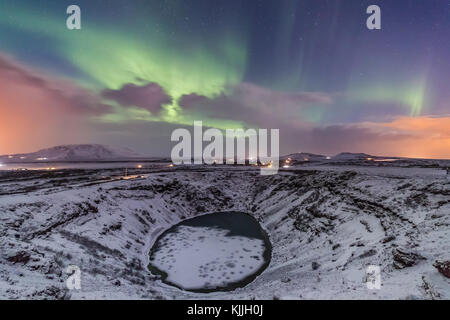 The northern lights putting on a great show, unfrotunately the cloud came in. Stock Photo