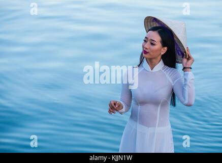 Vietnamese woman wearing Ao Dai dress during the Mid autumn