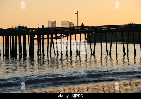 Capitola Wharf, silhouetted at sunset. Stock Photo