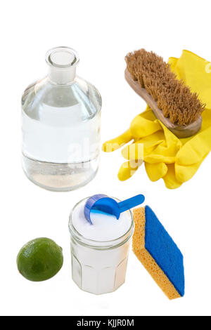 top view of baking soda with ,blue, spoon yellow gloves, brush lemon, vinegar, natural mix,for effective house - green cleaning concept Stock Photo