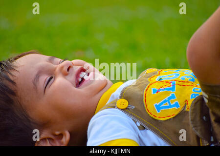 Cute Baby playing in the garden, Pune, Maharashtra. Stock Photo