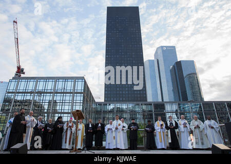 Ecumenical prayer meeting at dawn on Easter sunday in Paris-La Defense, France. Stock Photo