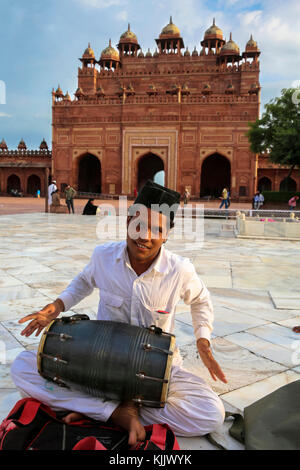 Qawali musician performing in the courtyard of Fatehpur Sikri Jama Masjid (Great Mosque), Fatehpur Sikri. India. Stock Photo