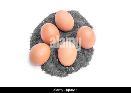 five eggs , raw eggs on the soil Isolated on white background ( You can paint on there's egg ) Stock Photo
