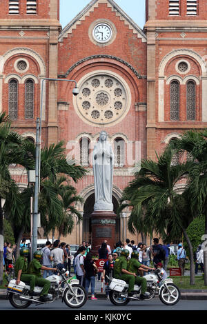 Notre Dame Cathedral and Virgin Mary statue. The  neo-Romanesque Catholic church built by the French in 1863. Ho Chi Minh City.  Vietnam.