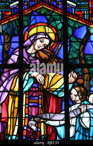 Dalat cathedral.  Stained glass window. Saint Cecilia  is the patroness of musicians. Dalat. Vietnam. Stock Photo