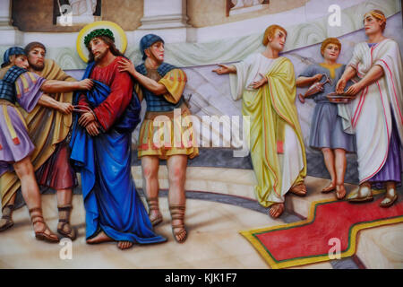 Our Lady of Fatima church.  Way of the cross.  Station 1. Pilate condemns Jesus to die. Ho Chi Minh City.  Vietnam. Stock Photo