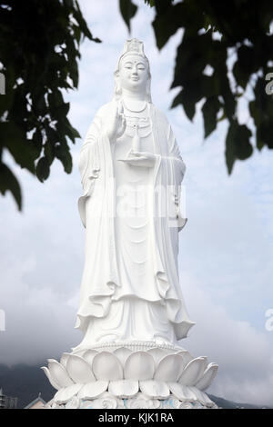 Linh Ung buddhist pagoda.  Quan Am bodhisattva of compassion or goddess of Mercy or lady Buddha.  Giant statue 67 m.   Danang. Vietnam. Stock Photo