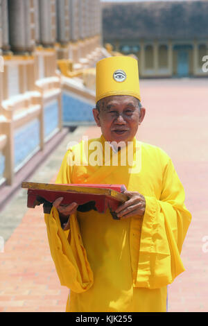 Cao Dai Holy See Temple.  Elederly priest.  Thay Ninh. Vietnam. Stock Photo