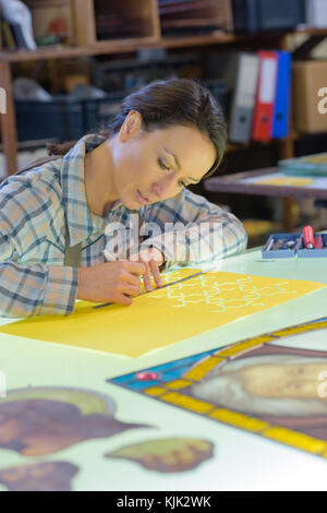 Female artist in workshop Stock Photo