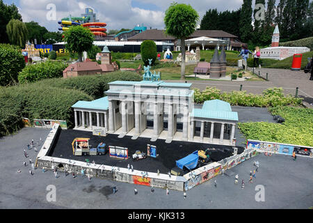 A miniature of the Brandenburg Gate in Berlin, shortly after the fall of the Berlin Wall, at the exhibition site of Mini-Europe in the Belgian capital Brussels, 26.06.2017.  The Brandenburg Gate in Berlin was built between 1789 and 1793 under Prussian King Friedrich Wilhelm II based on designes by Carl Gotthard Langhans. The Quadriga sculpture on top of the gate was designed by sculptor Johann Gottfried Schadow. Mini-Europe is a park located in Bruparck at the base of the Atomium in Brussels. In the park, the most impressive monuments in the European Union are recreated on a scale of 1:25. Aro Stock Photo