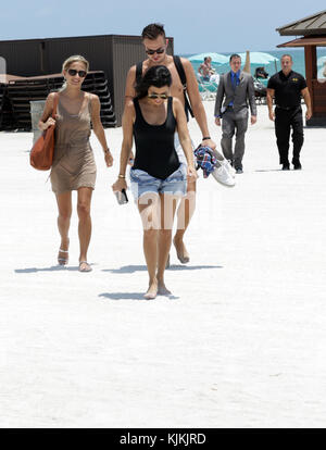 MIAMI BEACH, FL - MAY 03: Kourtney Kardashian wearing shorts and a black one piece swimsuit enjoys a beach day with her kids Mason, Penelope and Reign Disick on May 3, 2016 in Miam Beach, Florida.   People:  Kourtney Kardashian Stock Photo