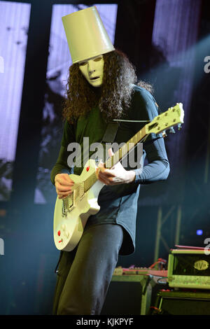 FORT LAUDERDALE, FL - FEBRUARY 28: Brian Patrick Carroll AKA Buckethead performs at The Culture Room. Brian Patrick Carroll (born May 13, 1969), known professionally as Buckethead, is an American guitarist and multi-instrumentalist who has worked within many genres of music. He has released 264 studio albums, four special releases and one EP. He has also performed on more than 50 other albums by other artists. His music spans such diverse areas as progressive metal, funk, blues, jazz, bluegrass, ambient, and avant-garde music. Buckethead is famous for wearing a KFC bucket on his head, emblazon Stock Photo