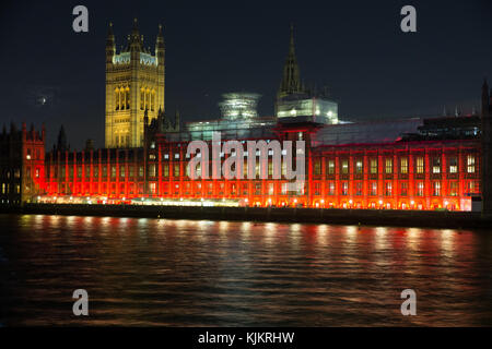 The Houses of Parliament lit red to highlight religious persecution.Known as 'Red Wednesday' its aim is to flag up minority religious faiths. Stock Photo