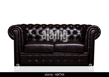 Vintage old dark brown leather sofa isolated on white background Stock Photo