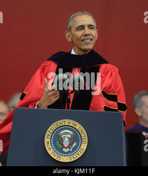 NEW BRUNSWICK, NJ - MAY 15: President Barack Obama receives honory degree from Rutgers President Robert Barchi and gives the commencement speech at Rutgers University's 250th anniversary on May 15, 2016 in New Brunswick, New Jersey.   People:  Barack Obama Stock Photo