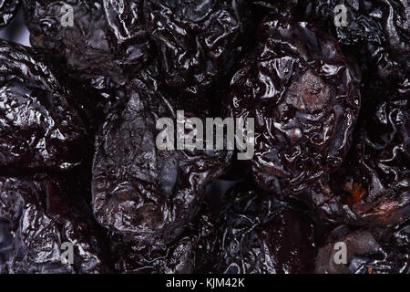 Top view of prunes as background texture. Stock Photo