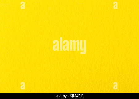 Yellow coloured felt, background. Stock Photo