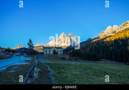 Tre Cime (Three Peaks) di Lavaredo seen from village of Misurina in autumn time, Dolomites., Italy. Stock Photo