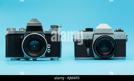 Analog Cameras with blue Background Stock Photo