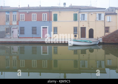 Comacchio (Italy) - Characteristic and fascinating historic town in the Park of the Po Delta, with its canals and pastel-coloured houses Stock Photo