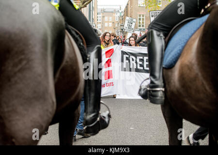 Confrontation between students and police at the protest demo for the Campaign Against Education Fees and Cuts, through the streets of  London, UK. Stock Photo