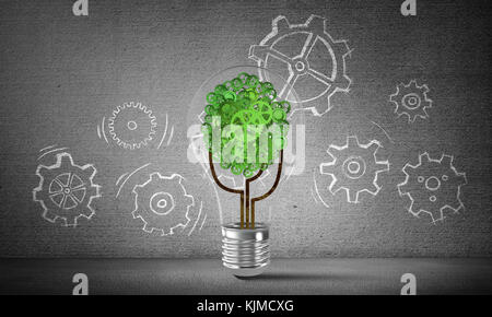 Eco innovations concept by means of lightbulb. Stock Photo