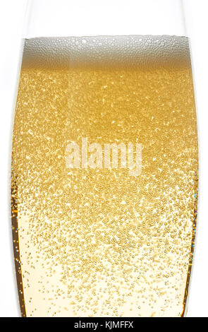 Champagne foam and bubbles in the glass closeup Stock Photo