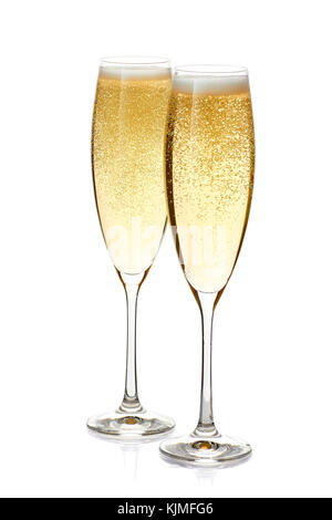 Two glasses of champagne with foam and bubbles on white Stock Photo
