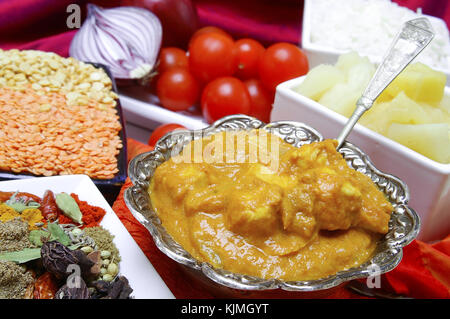 chicken korma with pilau rice on white Stock Photo