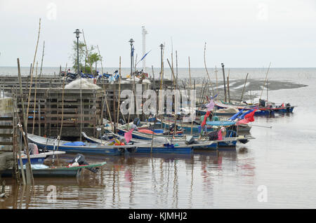 Kuala Selangor,Selangor,Malaysia - circa february : scenery of fisherman's jetty with boat.fisherman always go out in early morning to catch fish Stock Photo