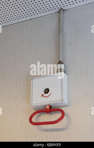 Emergency hand brake in a dutch train Stock Photo