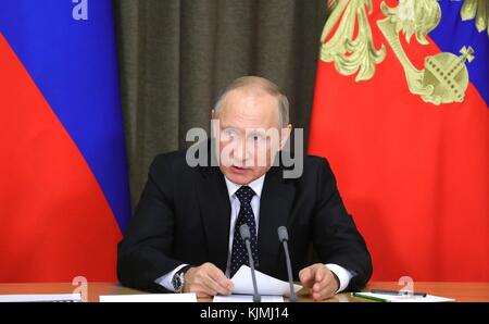 Russian President Vladimir Putin during a meeting with Defense officials at the Bocharov Ruchei residence November 23, 2017 in Sochi, Russia. Stock Photo