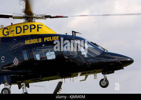 hover taxiing with Heddlu Police titles Stock Photo