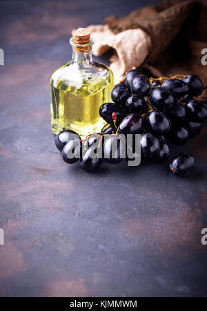 Grape seeds oil in small bottles Stock Photo