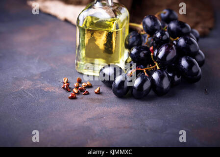 Grape seeds oil in small bottles Stock Photo