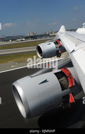 Landing aircraft reverse engines during a snowstorm and poor visibility ...