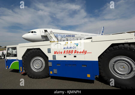 Airbus A340-642 with an Aviance towbarless tug parked in the static-display at the 2006 Farnborough International Airshow Stock Photo