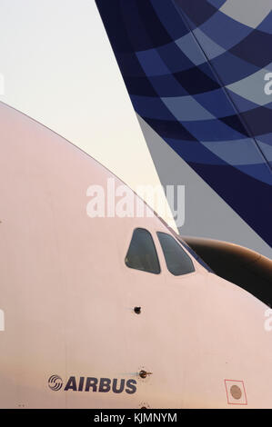 windshield and door of the Airbus A380-800 and tail-fin of the A340-600 parked in the static-display at the 2006 Farnborough International Airshow