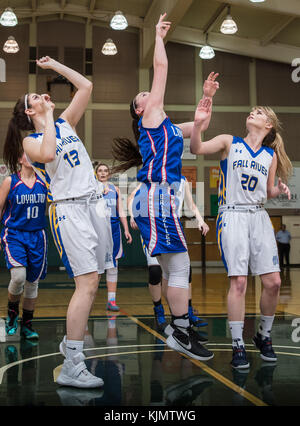 High school basketball action with Fall River vs. Loyalton in at the Shasta College Gym in Redding, California. Stock Photo