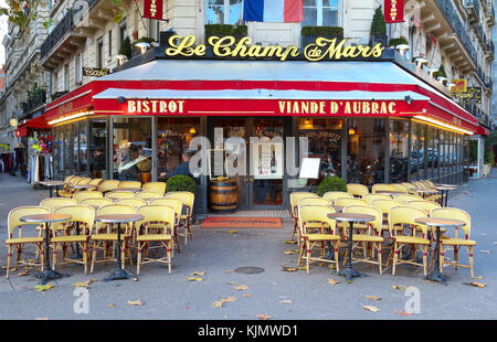 Le Champ de Mars is traditonal French cafe located near the Eiffel tower in Paris, France. Stock Photo