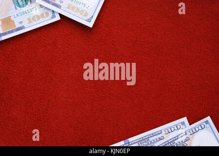 Dollars on red felt table. Template and background Stock Photo