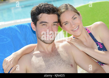 Portrait of couple sunbathing Stock Photo