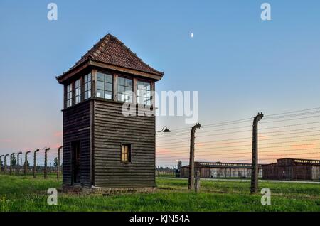 OSWIECIM, POLAND - JULY 29, 2017: Watchtower in the concentration camp Auschwitz Birkenau in Oswiecim, Poland.