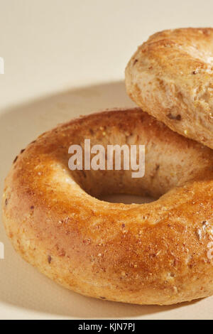 two whole wheat bagels Stock Photo