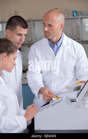 young scientist works in modern chemistry lab Stock Photo